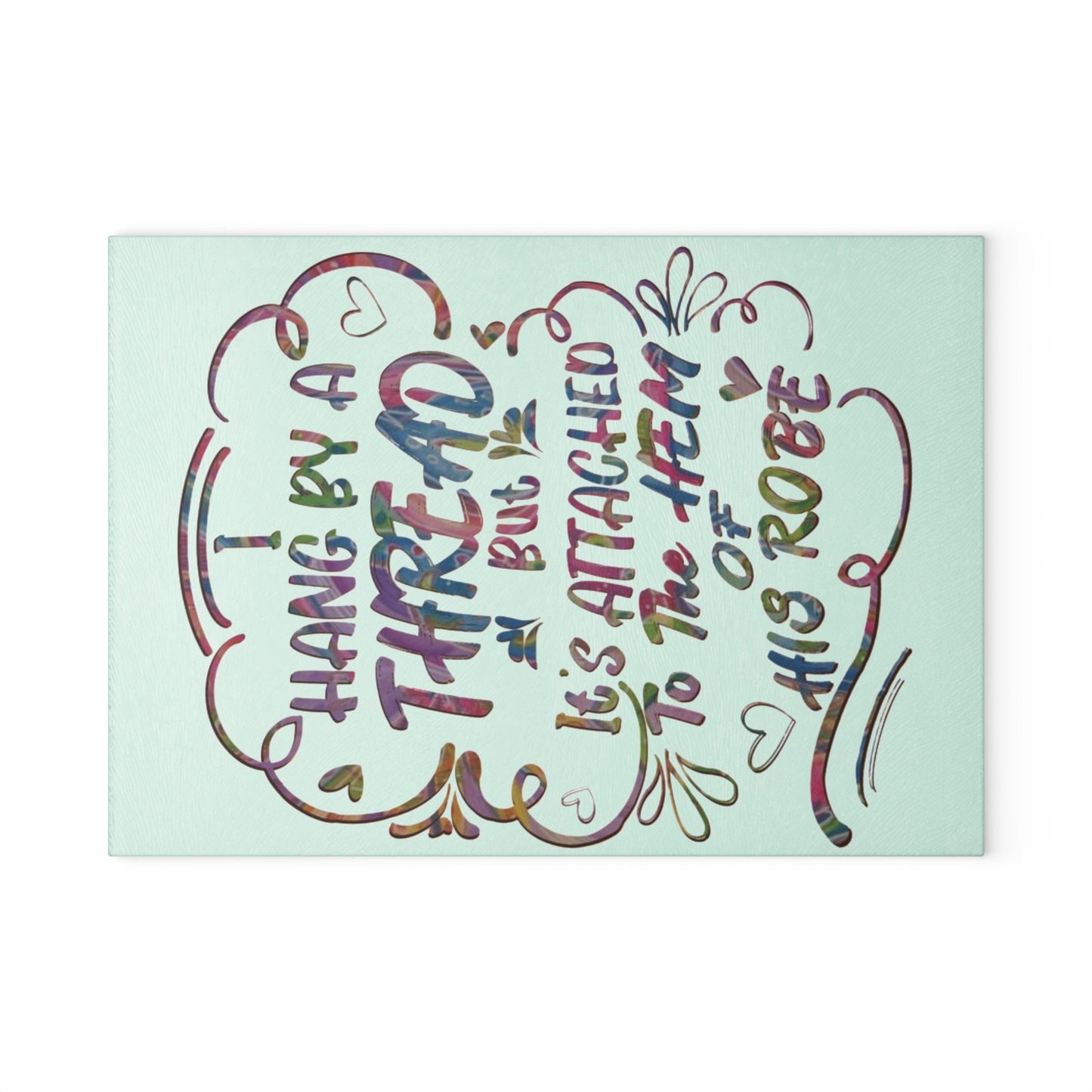 Hanging on to his Robe inspirational Glass Cutting Board